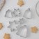 A set of forms for cutting the cookies of the share "bell, snowflake", 6 objects, silver color