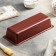 The baking sheet is “Fun”, 30 × 11 cm, h = 6.5 cm, anti -stick coating, burgundy color