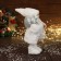 Santa Claus "in a white fur coat, with a flashlight and gifts" 30 cm