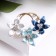 Brooch "Flowers" Trio, color white-blue in gold