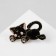 Icon "kitten" toy, black-pink color in gold