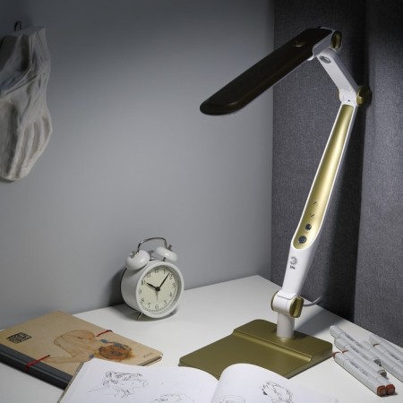 NLED-497-12W-G desktop lamp on the clamp and with the base of gold