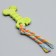 Chewing toy with a rope "bone with a tail", green