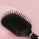 The comb is massage, wide, with a mirror, 8.3 × 24 cm, black/white color