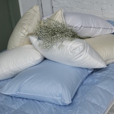 The pillow is low, size 70x70 cm, color mix