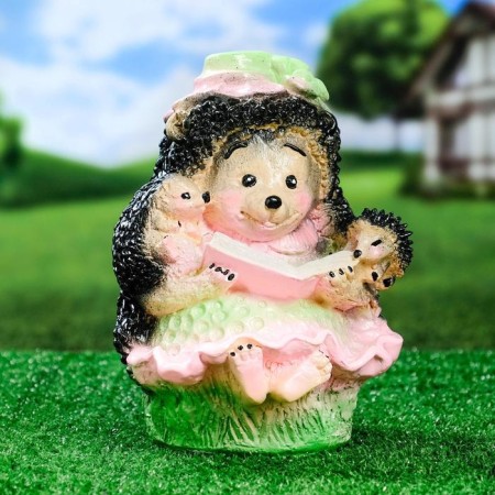 Garden figure "Hedgehog with a book" 25x17cm