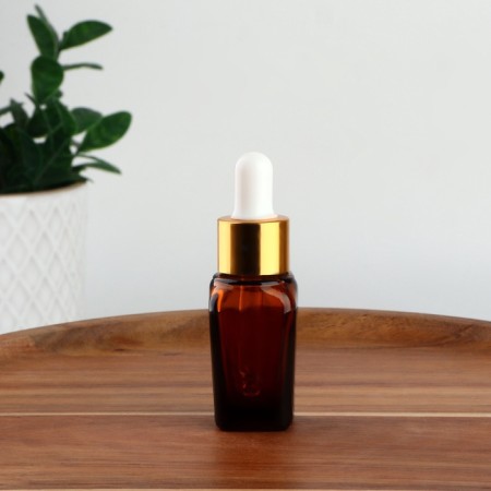 A bottle for storage, with a pipette, 10 ml, brown/gold color-1