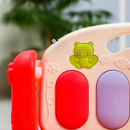 Developing rug "baby game", with a piano, round, pink-12