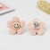 Clips children's “chosen” flower smile, the color is pink-brown