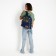 Backpack school textile art, with an overflowing patch, the color of the dark blue