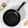 The “Tradition” pan, D = 24 cm, plastic handle, anti -stick coating, black color