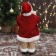 Santa Claus "in a golden red suit, with a strap, with gifts" 15x30 cm