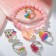 Set of children's “chosen” 6 objects: bracelet, 5 rings, heart, shape mix, color