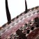 The bag is economic on the button, brown color/multi -colored
