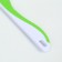 A comb for wool 15.6 x 5.3 cm, long teeth 3.4 cm, white-green