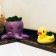 Concrete "duck" 6x8x5.5 cm yellow with moss (moss green. Stabilized)