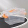 The storage container is plastic, 20 × 15 × 11 cm, a cover with a handle on a latch, matte