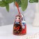 Matryoshka bell is medium, Khokhloma, 7 cm