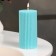 Candle-cylinder with faces, 5x10 cm, turquoise, 6 hours