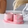 Candles in concrete on the stand "Loft", soy wax, wooden wick, white-pink