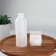 A bottle for staining, with a dispenser, 17 × 4.5 cm, white color
