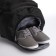 A backpack-samka with a zipper, 4 outer pockets, a shoe compartment, black color