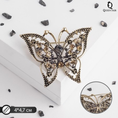 Brooch "Butterfly" leopard, golden gray color in black gold
