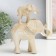 Polystone souvenir "White Elephant with an elephant on the back, with gold - layers" 16x7x19.5 cm