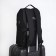 Male backpack on lightning, 3 outer pockets, a USB connector, a suitcase mount, dark gray color