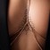 Erotic accessory on the chest, golden