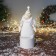 Soft toy "Santa Claus in a suit with flowers and in a cap" 48x19 cm, golden-white
