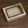The box is folding, the lid is, with the “Bunning of the Rowan” window 24 x 17 x 8 cm
