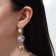 Hanging earrings with rhinestones "Heart", colored in gold