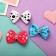 Hair clip "Bow Shwl" rhinestones, 5 cm, mix
