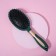 The comb massage, rubberized handle, 7 × 25 cm, green/golden color