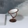 The mirror of the desktop "oval", two -sided, with an increase, the mirror surface is 8.5 × 12.1 cm, the color is black/copper