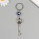 Keychain from the evil eye Metal "key with crown" 3x8.2 cm
