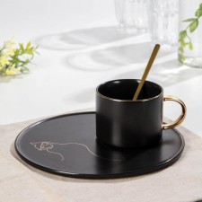 Tea couple ceramic with a spoon 