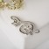 Brooch "Violin key" and notes, white color in silver
