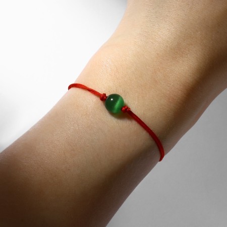 Bracelet-reinforcing "red thread" cat eyes, green color, d = 8-3