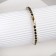 Bracelet with rhinestones "shine" thin thread, black color in gold, 18 cm