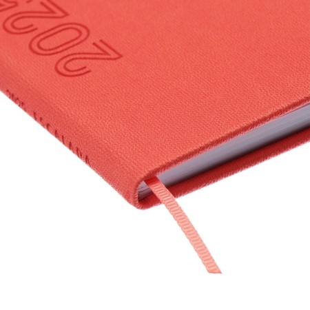 The weekly dated 2025, 85x145 mm, 64 sheets of Escalada, a solid cover made of artificial leather, pancake embossing, block 70 g/m², coral-2