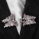 Cardigan clamp "Butterflies", pink color in silver