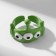 Ring "Montrustrik" with antenna, the color is green, dimensionless