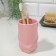 A glass for the pink toothbrushes, 11 x 7.5 cm