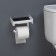 A holder for toilet paper with a shelf, white color