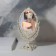 The mirror is desktop, bilateral, with an increase, a mirror surface 13.5 × 18.5 cm, beige color