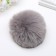 Pompon artificial fur "light gray" d = 10 cm