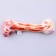 A toy for dogs with a bone of textiles, 19.6 x 6.6 cm