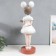 Souvenir Polystone stand "Baby with ears, in a white dress" D = 26 cm 81x40x40 cm